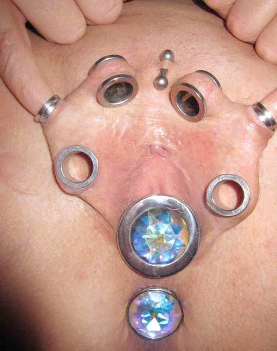 Slideshow erotic body modification.
